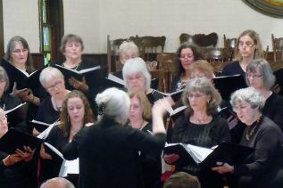 Betty Wagner directs the Frontenac Women's Chorus in their “Rock On, Frontenac” concert in Verona